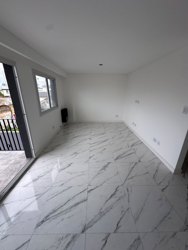 VENTA DEPARTAMENTO 2 AMBIENTES A ESTRENAR CON BALCON Y COCHERA